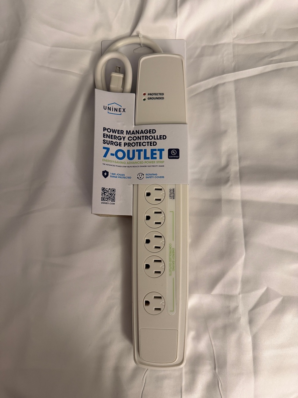 Uninex 7-Outlet Energy-Controlled Surge Protector Power Strip - White